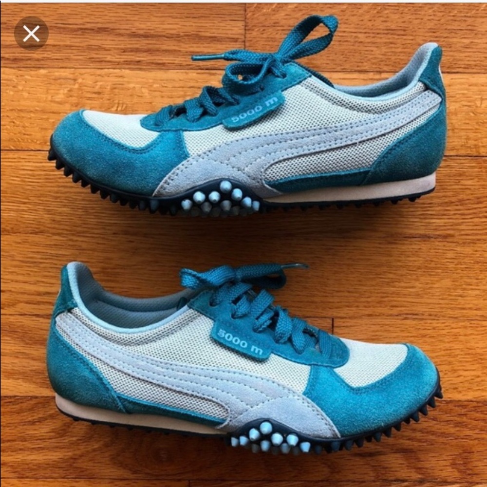 Never worn Turquoise Pumas